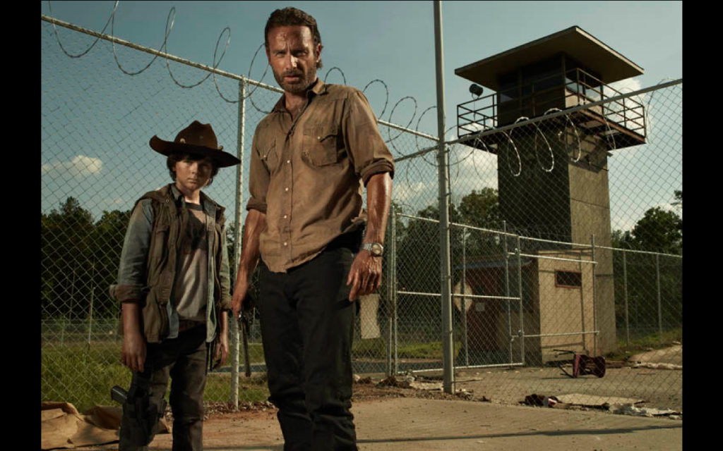 Walking Dead season 3, Carl Grimes (Chandler Riggs) and Rick Grimes (Andrew Lincoln). Photo by Frank Ockenfels/AMC. 