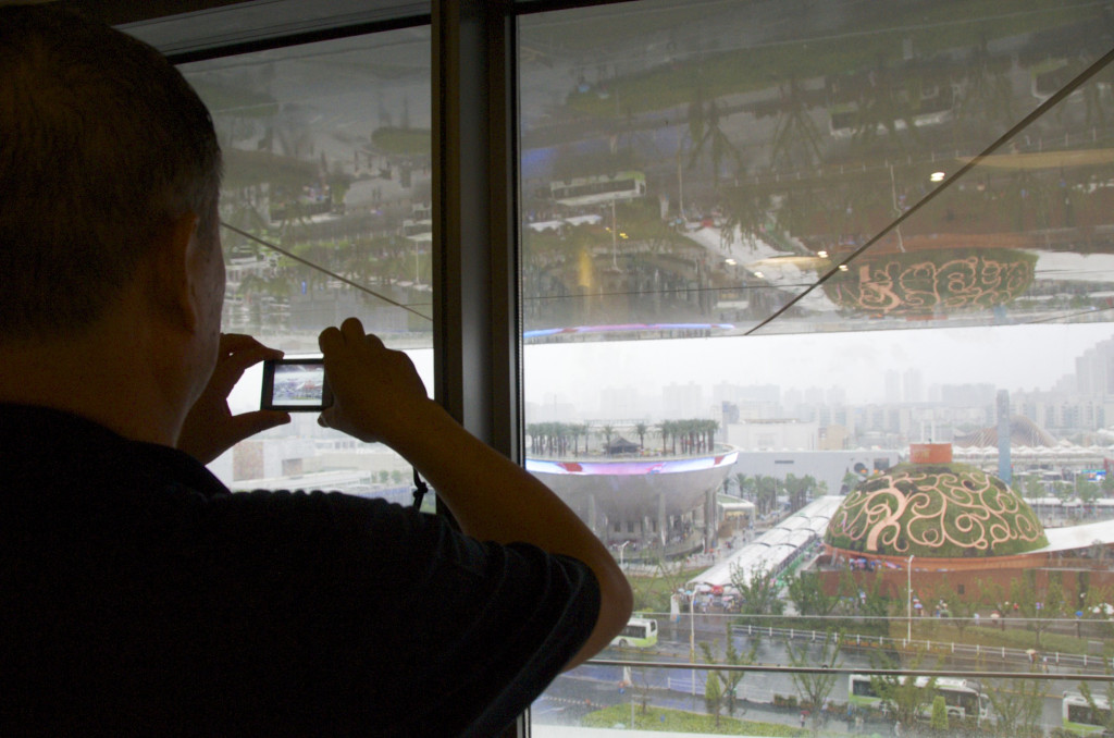 A visitor photographing the Indian Pavilion at the 2010 Shanghai World Expo, the largest international exposition ever held. 